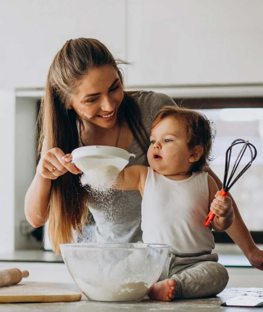 mother with baby in kitchen